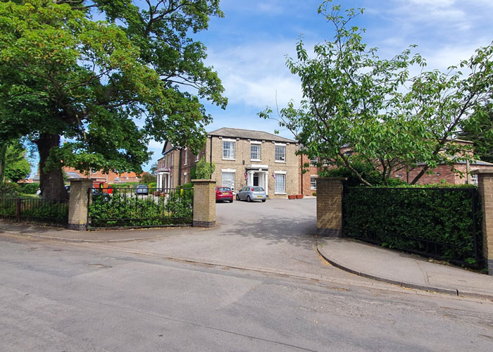 The entrance and driveway to Figham House Care Home in Beverley