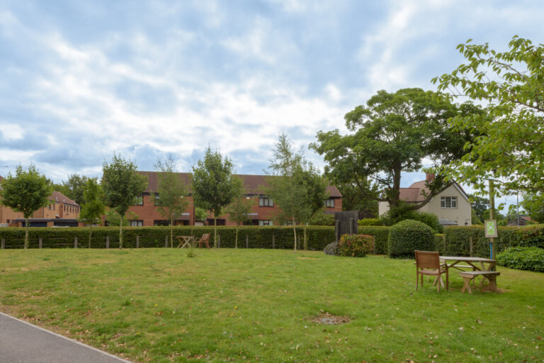 Experience the lovely open garden area at our care home, a secure and serene spot for residents to relax and enjoy the sunshine.