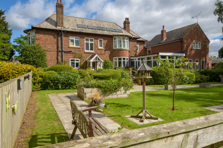 A view of the garden and sun room where the residents sit to look at the gardens at Cranswick Lodge Care Home in Hutton Cranswick spend hours in the garden, which is a safe space.