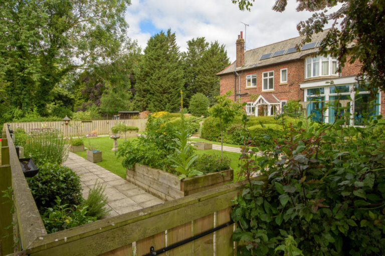 The gardens at Cranswick Lodge are beautiful. There are often summer fairs, where the local community support the care home.