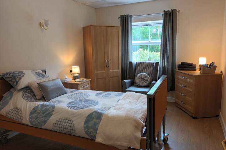 Explore another inviting bedroom at Alpine Lodge Care Home in Stocksbridge, thoughtfully arranged to offer comfort and tranquility to our residents.
